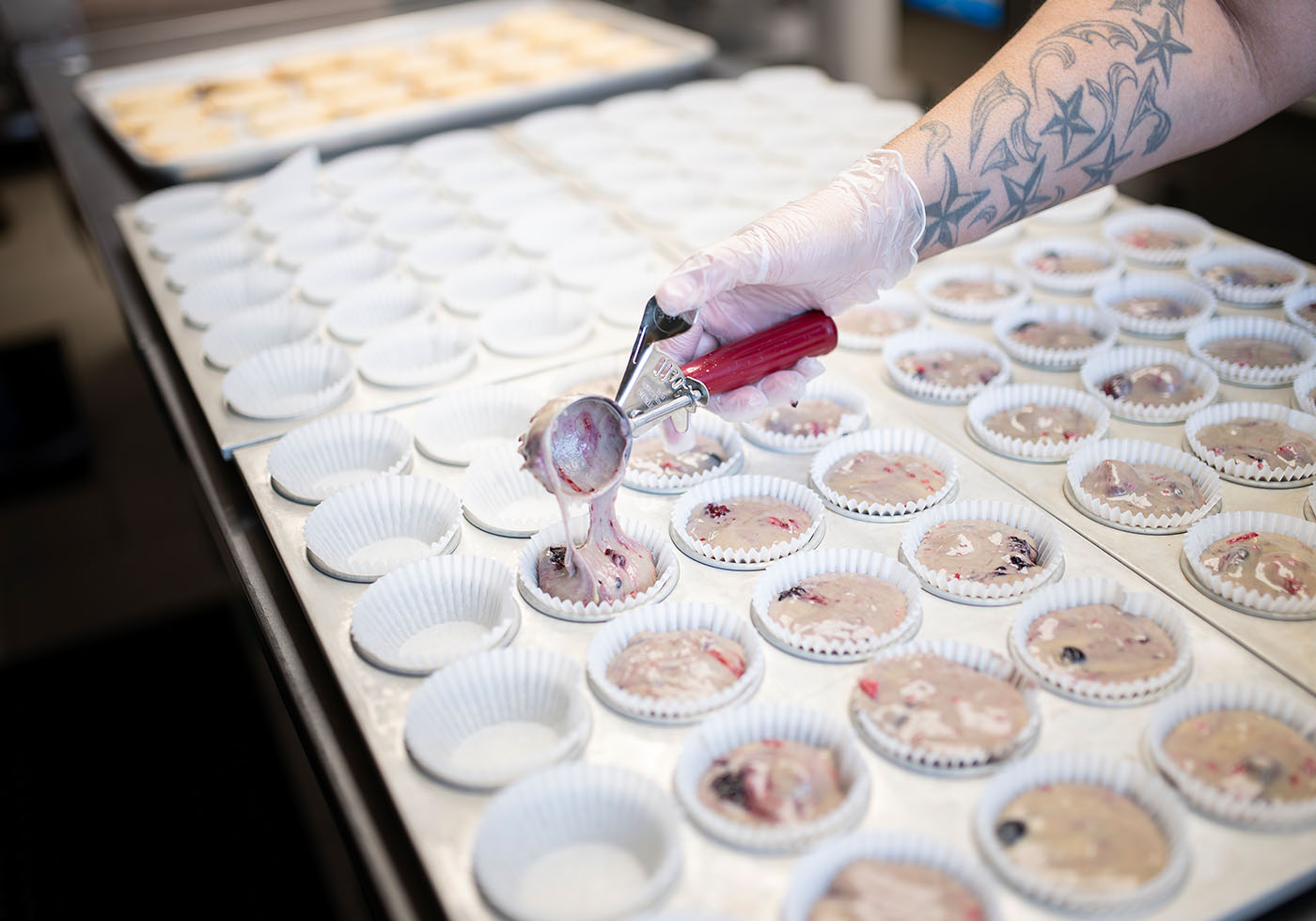 Food services filling cupcakes